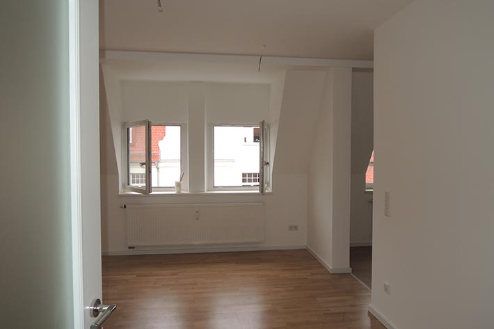 Komplettinnen- und Hofsanierung mit Anbau Balkone