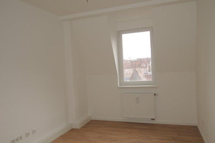 Komplettinnen- und Hofsanierung mit Anbau Balkone